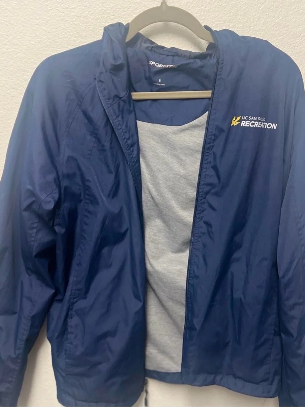 Sport-Tek Navy Windbreaker with UC San Diego Recreation Logo
